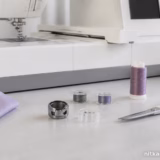 Janome Memory Craft 550E: як правильно заправити шпульку